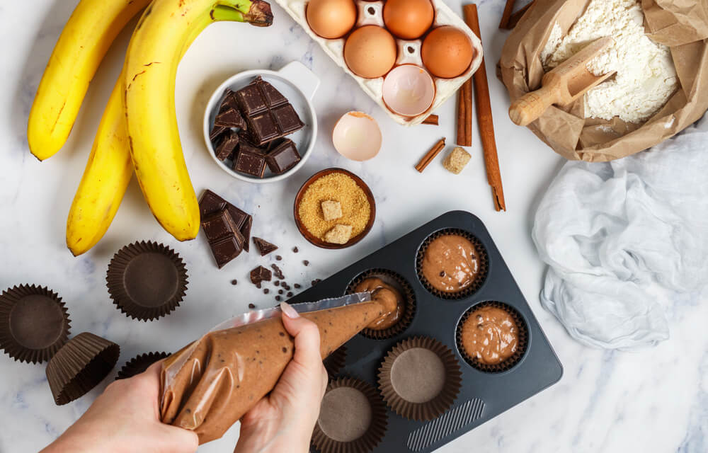 Woman baking banana muffins