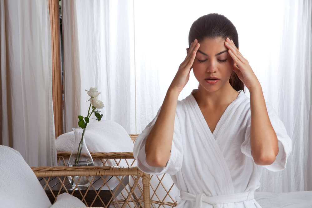 Woman doing facial massage