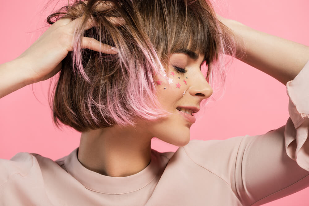 Woman with pink highlights